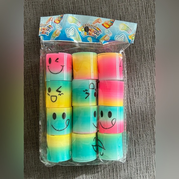 Other - Slinkys Party Favor bag - 12 small emoji rainbow slinkys
